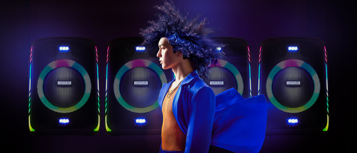Wall of BlueAnt X5i party speakers lit with colourful RGB rings